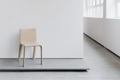 Illustrative chair room photograph from this direction’s retained stock
